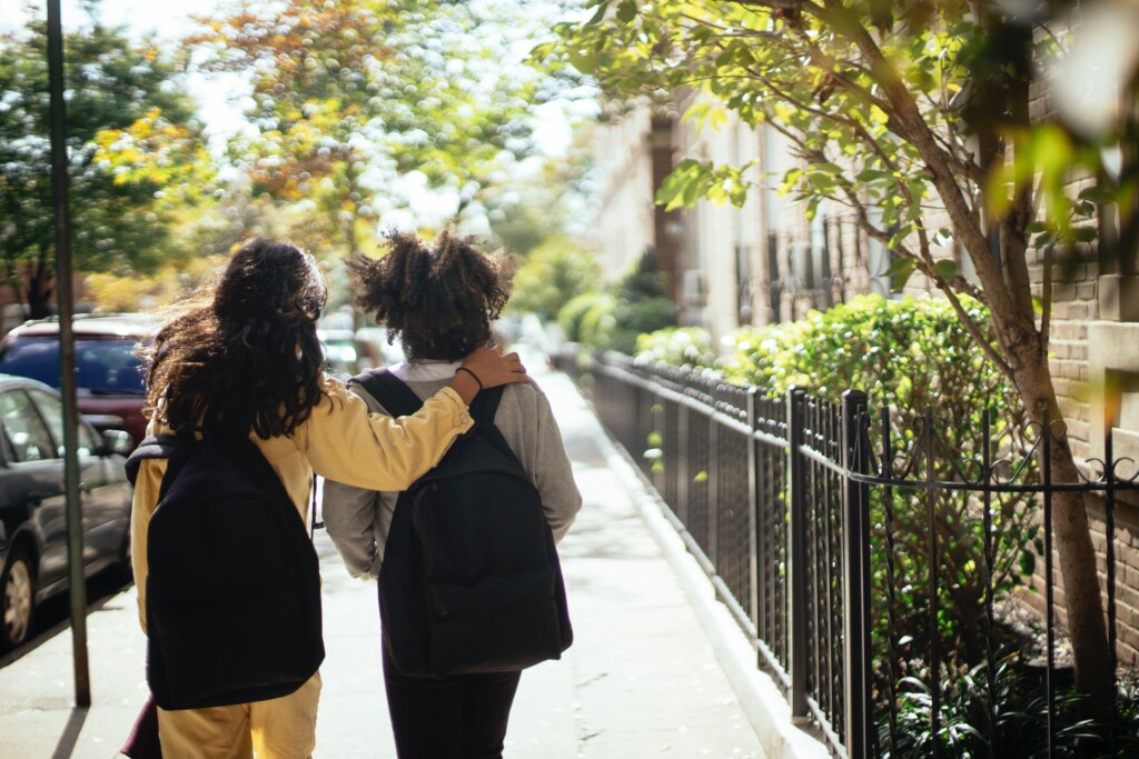 Two girls on their way to school