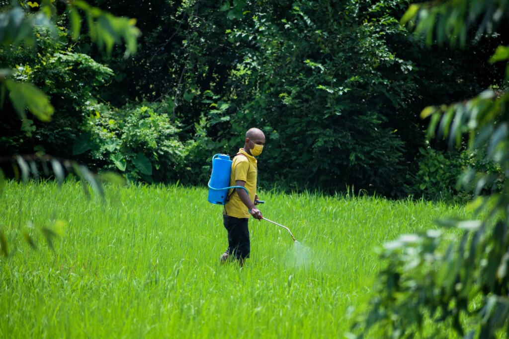 a person using pesticides